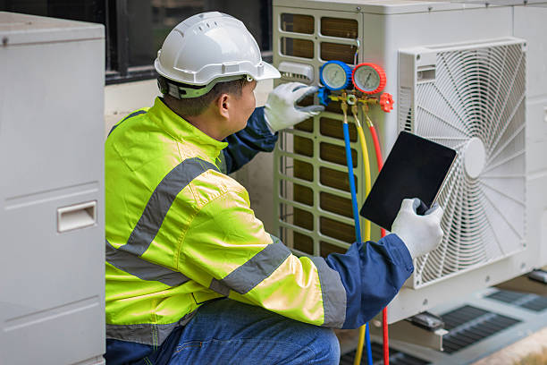 Professional Heat Pump Repair technician working in Harvard, NE